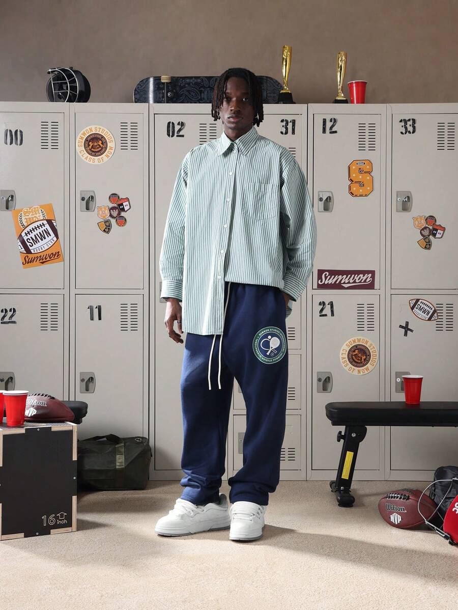 Pantaloni della tuta con cavallo basso SUMWON, con stemma ricamato del club di tennis, vestibilità morbida e rilassata, con coulisse ed elastico in vita, pesanti e confortevoli, adatti per l'abbigliamento casual in inverno, autunno e primavera, tinta unita - Blu Navy - Visualizzare 1