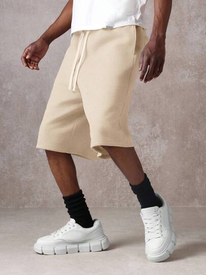  SUMWON 舒适低裆百慕大短裤，抽绳设计，休闲夏季及膝宽松居家短裤，带后口袋，四季必备纯色款