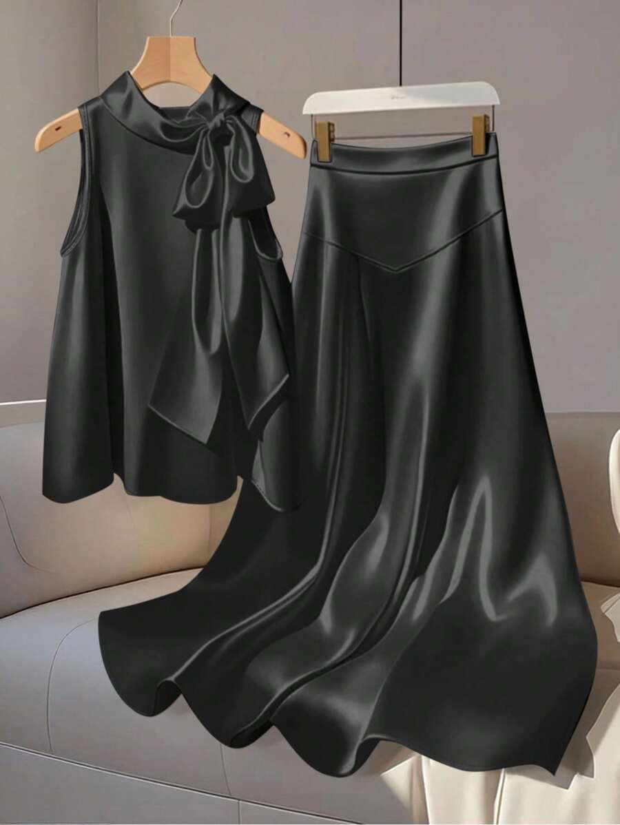 GlowEve Bộ 2 món áo và chân váy thanh lịch không tay bằng vải satin có nơ cổ đứng dành cho nữ - màu đen - Xem 1