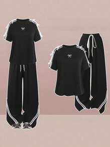 SHEIN LUNE Bộ đồ thể thao 2 món cỡ lớn dành cho nữ, áo thun tay ngắn thêu họa tiết sọc và nơ trang trí phong cách sinh viên dễ thương, quần cạp chun, thích hợp mặc hàng ngày và mùa tựu trường - màu đen - Xem 1