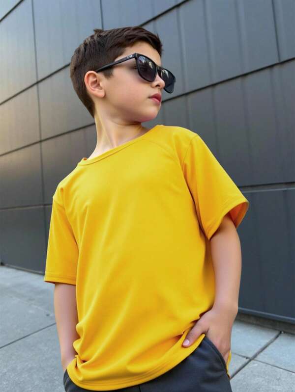 SHEIN Tween Boys' Loose And Simple Round Neck Solid Color Raglan Sleeve Short Sleeve T-Shirt