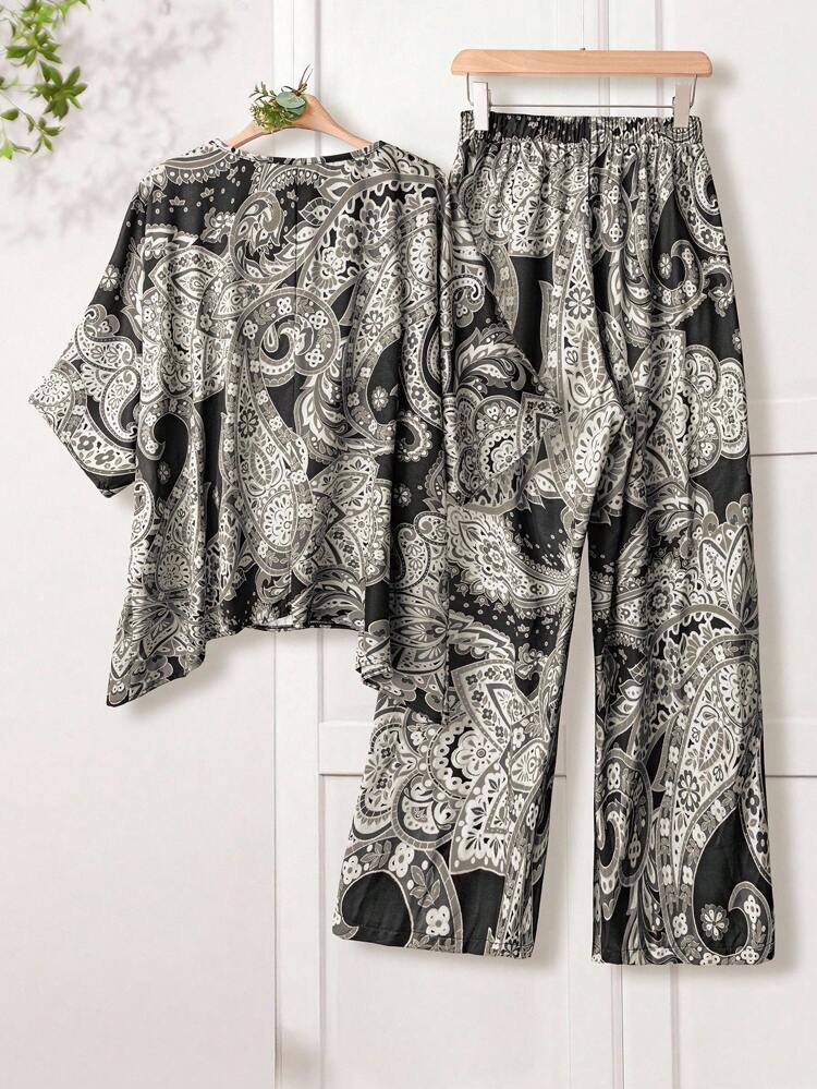 Conjunto de 2 piezas de top de cuello redondo y pantalones con estampado, talla grande