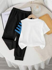 SHEIN 2 pièces/Set Style décontracté jeune garçon Vert militaire Dinosaure et Animal de bande dessinée blocs de couleurs Y2K Sportif Vacances Col rond Haut à manches courtes et Pantalon - Multicolore - Voir 3