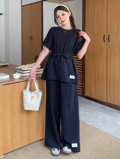 SHEIN طقم قطعتين من مجموعة Teen Girls: بنطلون فضفاض بأكمام راجلان وربطة عنق وساق واسعة، مناسب للربيع/الصيف، والفراغ، والخروجات العرضية، والربيع/الربيع، العطلات، العودة إلى المدرسة، نزهة عائلية في الخارج، ارتداء يومي