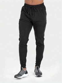 Manfinity Fitness Pantalon de sport pour homme style petit ami avec taille à cordon, poches latérales avec rabat, idéal pour l'automne, respirant