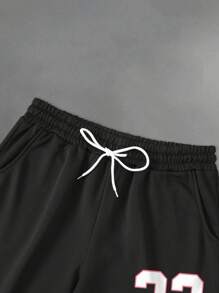 Manfinity EMRG 男士休闲宽松圆领短袖 T 恤和裤子套装，美国街头嘻哈风格 T 恤和喇叭裤两件套服装 - 彩色 - 查看 4