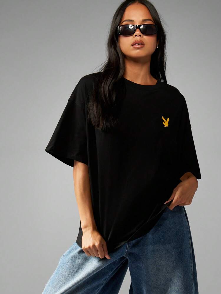 Missguided x Playboy Retro Magazin Cover Muster Oversized T-Shirt mit großem Grafikdesign auf der Rückseite, Vintage Foto Stil 90er Jahre Grunge Streetwear Ästhetik, lässige Loungewear Mode Statement