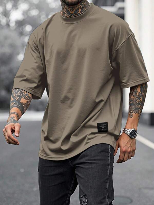 Manfinity Homme Men's Solid Color Round Neck Drop Shoulder Short Sleeve Casual Loose T-Shirt, Summer