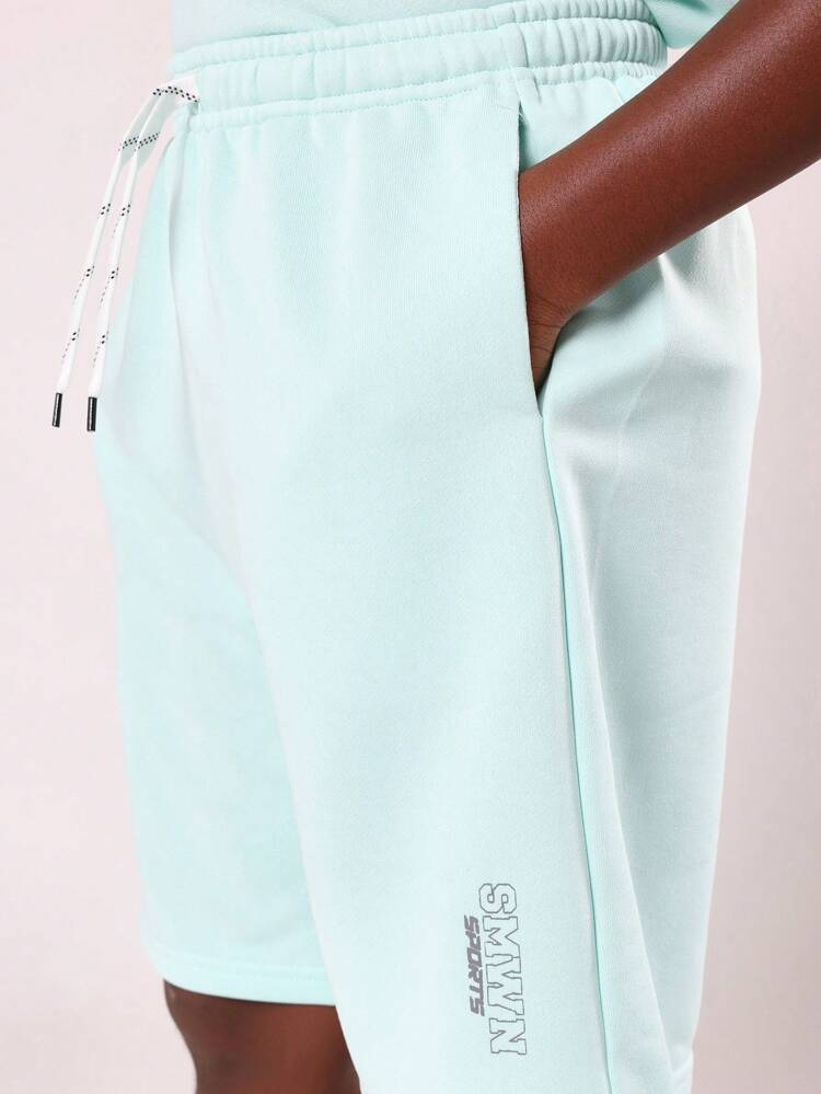 Sudadera extragrande con estampado de logotipo y pantalones cortos a juego