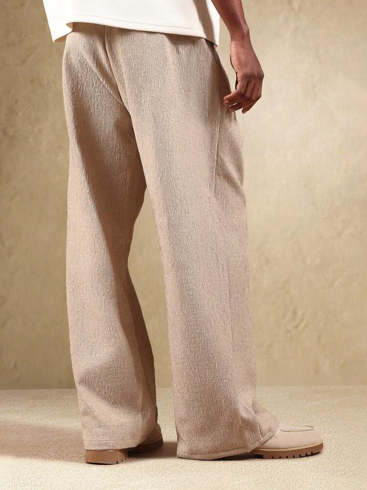 끈과 옆주머니가 달린 와이드 레그 텍스처 팬츠