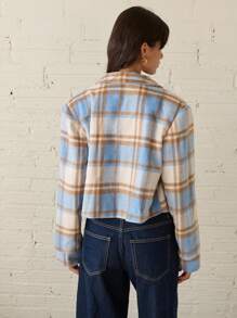 Nöista Veste courte bleue, marron et beige avec un placket à fermeture éclair en métal et un design de revers, convenant pour le printemps et l'automne.