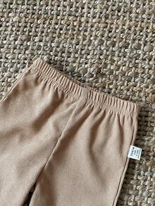 SHEIN Conjunto de 2 peças para bebês meninas, bebês recém-nascidos de 0 a 3 anos, casual, diário, estilo campestre, camisa de malha com gola Peter Pan e veludo cotelê cáqui, outono/inverno