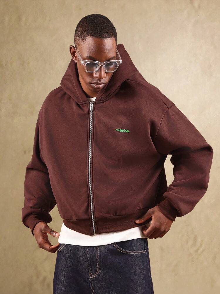 Skrócona bluza z kapturem zapinana na suwak i ściągaczem u dołu