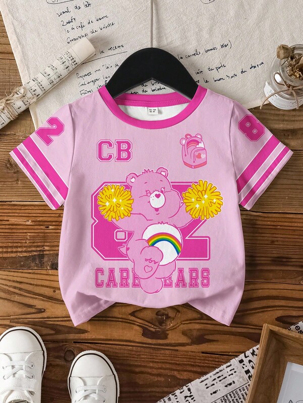 SHEIN X Care Bears Camiseta de manga corta con cuello redondo y estampado de dibujos animados y letras para niña