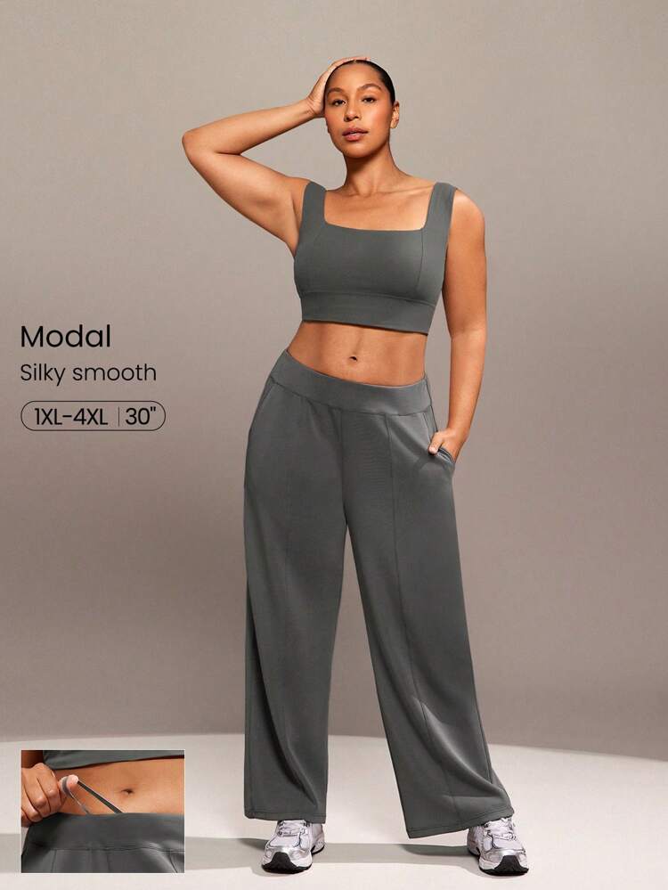 Pantaloni casual quotidiani in modal di taglia comoda, con vita regolabile con laccetto, e tasche laterali