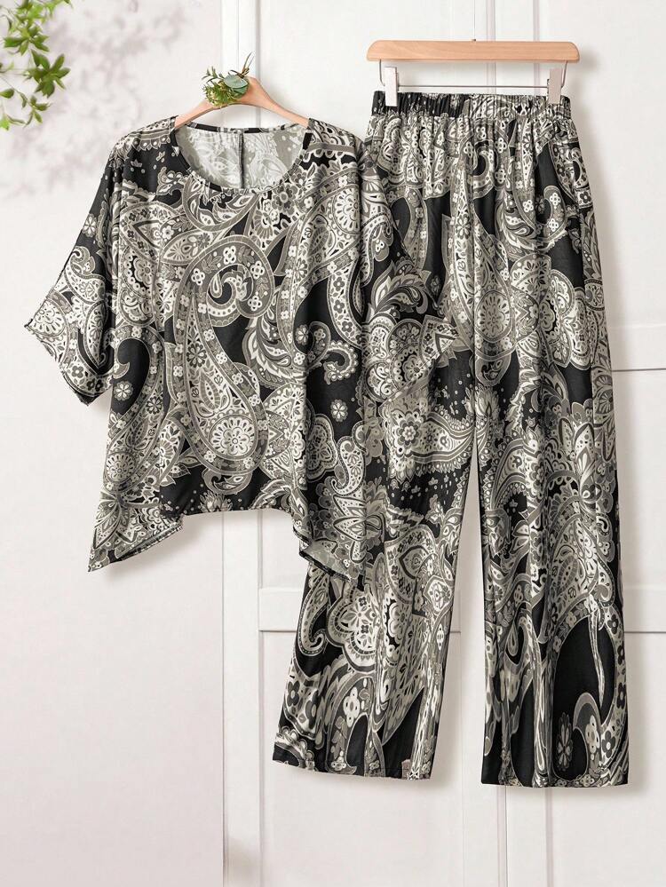 Conjunto de 2 piezas de top de cuello redondo y pantalones con estampado, talla grande