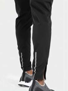 Manfinity Fitness Pantalon de sport pour homme style petit ami avec taille à cordon, poches latérales avec rabat, idéal pour l'automne, respirant