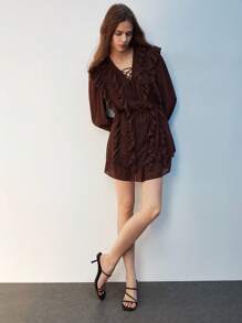 Maija Blusa elegante de manga larga con diseño de lazo y volantes en el bajo, de unicolor para mujer