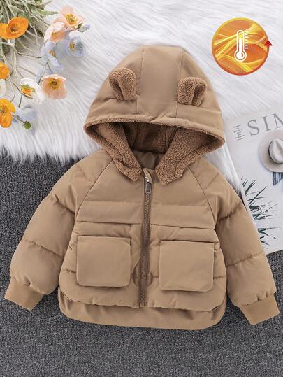 SHEIN Playful Pals Abrigo acolchado para niña, nuevo abrigo con capucha forrado de piel sintética con cremallera y bolsillos reales, diseño de moda con parte delantera corta y parte trasera larga para el otoño
