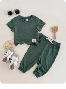 Bộ 2 món áo len cổ tròn tay ngắn và quần cạp chun màu xanh lá cây cho bé trai/bé gái mùa xuân/hè, chất liệu vải mềm mại và co giãn, thích hợp mặc khi đi chơi, đi nghỉ, đi học và ở nhà - Màu xanh Bạc hà - Xem 1