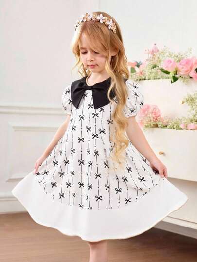 年轻女孩可爱优雅蝴蝶结细节拼色短袖连衣裙