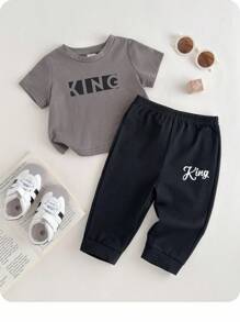 2pcs Baby Boy/Girl Summer Casual Fashion Cute Letter Print Short Sleeve Top And Elastic Waist Pants Set,Black Beach Wear For School,Travel,Sports - Multicolor - View 1