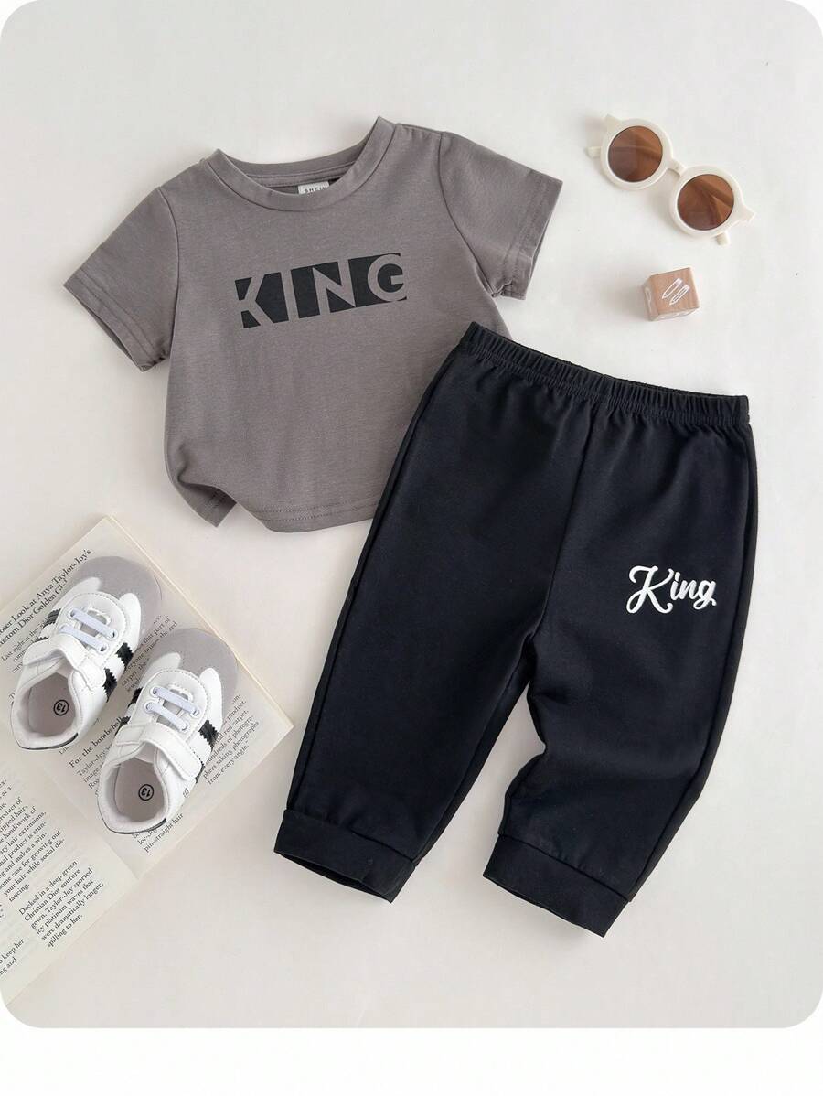 2pcs Baby Boy/Girl Summer Casual Fashion Cute Letter Print Short Sleeve Top And Elastic Waist Pants Set,Black Beach Wear For School,Travel,Sports - Multicolor - View 1