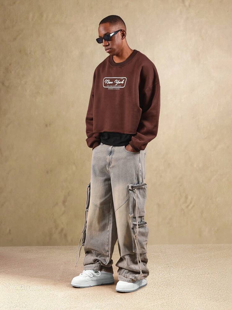 Kurzes Sweatshirt mit offenem Saum und Stadtlogo