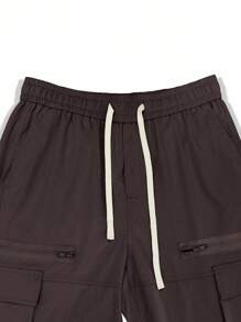 Manfinity Roghcode 秋季宽松男式翻盖口袋侧边工装裤