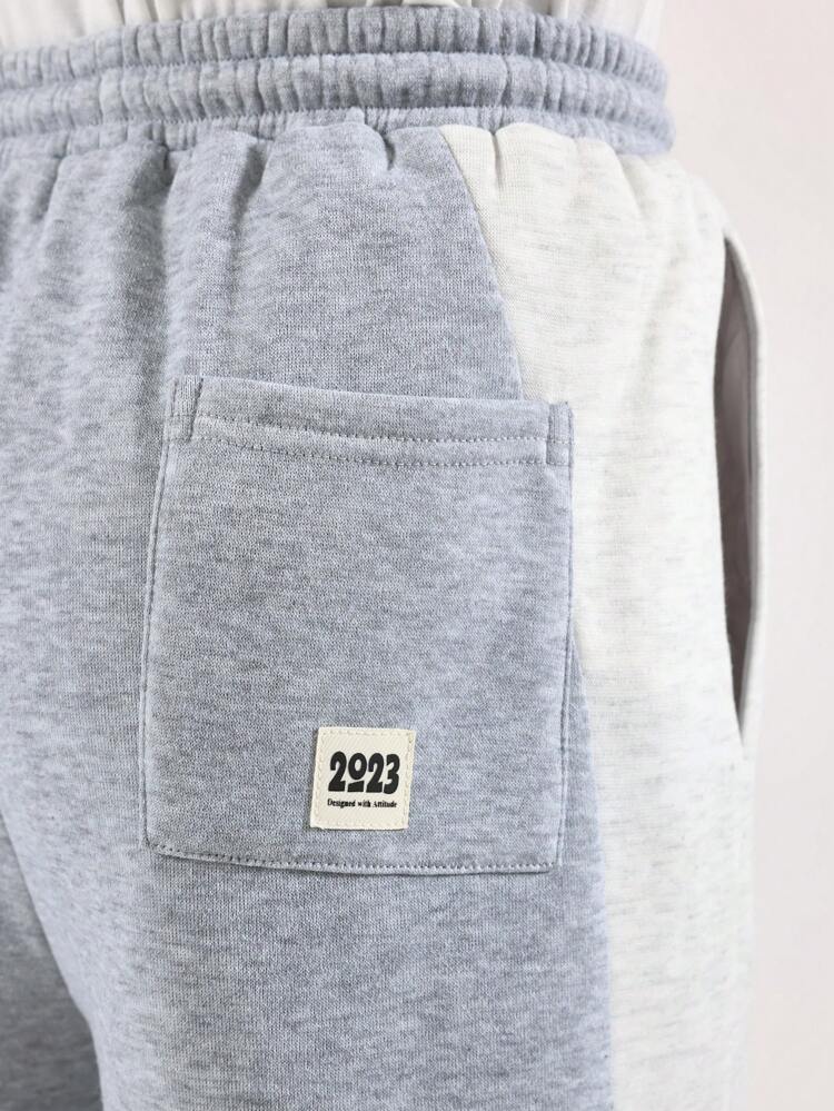 Spodnie dresowe z szerokimi nogawkami i kolorowym blokiem kolorów i ściągaczem