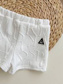 Bộ đồ thường ngày cho bé trai gồm áo tay ngắn in chữ 3D và quần short cạp chun. - trắng - Xem 6