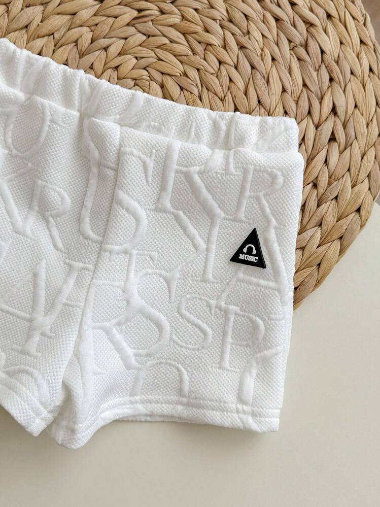 Bộ đồ thường ngày cho bé trai gồm áo tay ngắn in chữ 3D và quần short cạp chun. - trắng - Xem 6