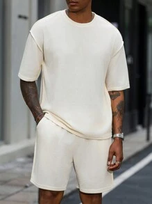 Manfinity Homme 2 件男士休闲纯色宽松短袖 T 恤和短裤套装 - 杏色 - 查看 1