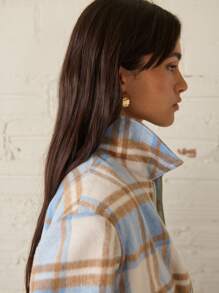 Nöista Veste courte bleue, marron et beige avec un placket à fermeture éclair en métal et un design de revers, convenant pour le printemps et l'automne.