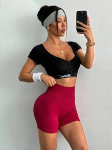 Dewbera Pantalones cortos deportivos elásticos sin costuras de cintura alta de unicolor