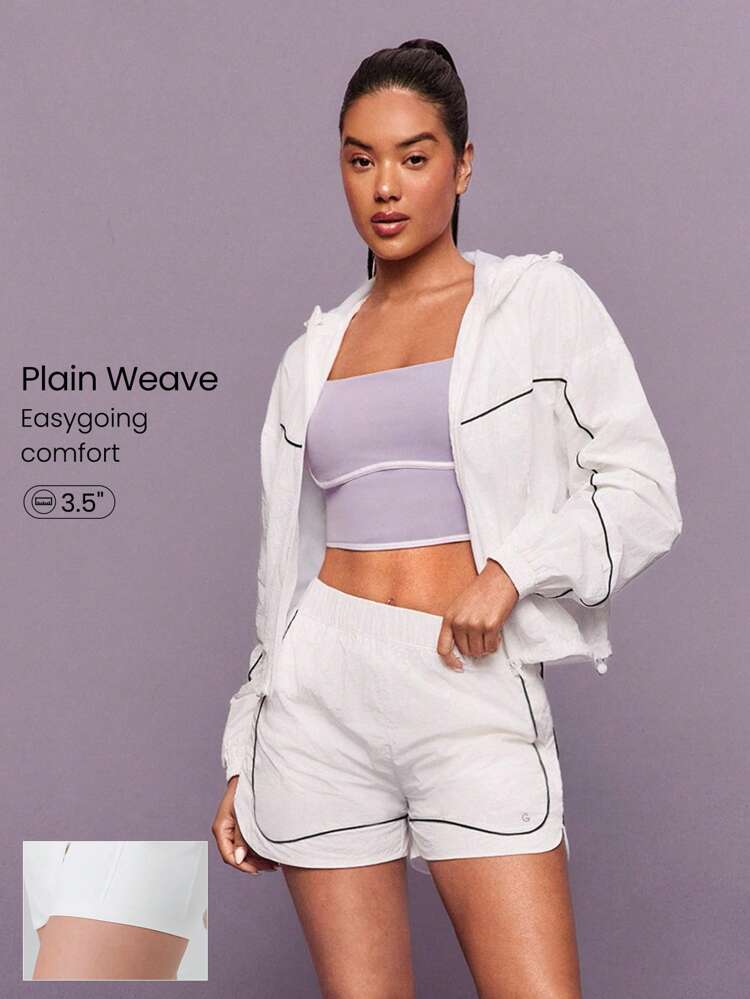 Short de coupe-vent léger record avec sous-vêtement intégré, coutures contrastées, poches, fermeture éclair. Idéal pour la course, le jogging, la gym, l'entraînement et le port casual quotidien