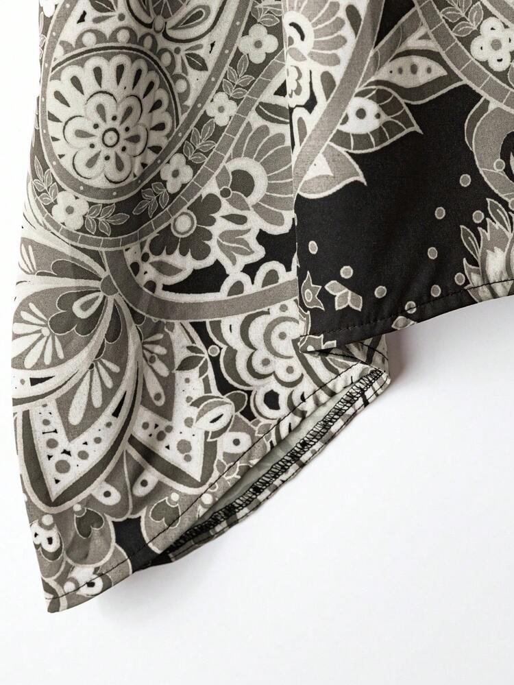 Conjunto de 2 piezas de top de cuello redondo y pantalones con estampado, talla grande