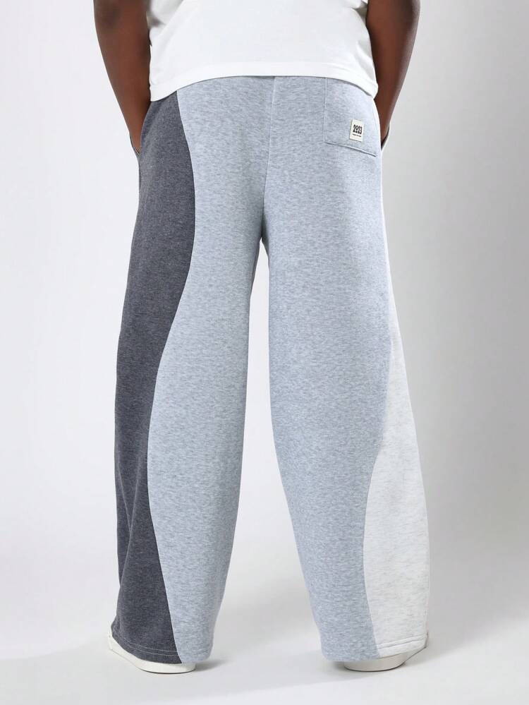 Spodnie dresowe z szerokimi nogawkami i kolorowym blokiem kolorów i ściągaczem