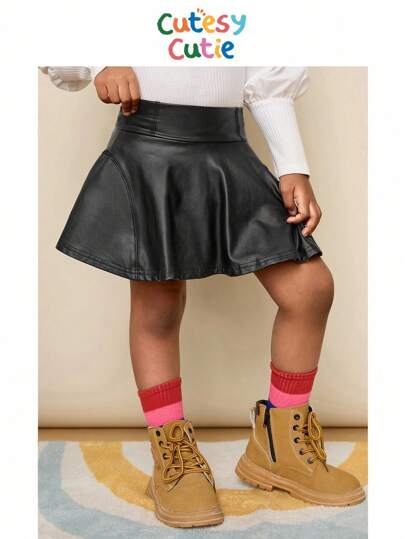 年轻女孩纯色PU皮革休闲迷你裙