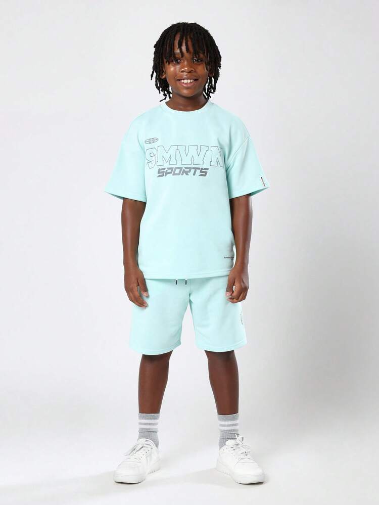 Sudadera extragrande con estampado de logotipo y pantalones cortos a juego