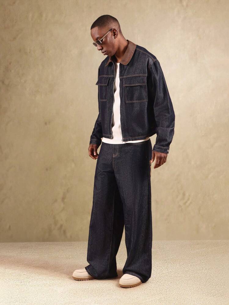 Veste camionneur en denim brut avec col en cuir et poches utilitaires