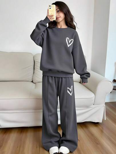 SHEIN Tonårsflicka Daglig Casual Streetwear Hjärttryck Stickad Enfärgad Lös Raglanärmad Huvtröja Och Plisserade Vida Ben Träningsbyxor Set