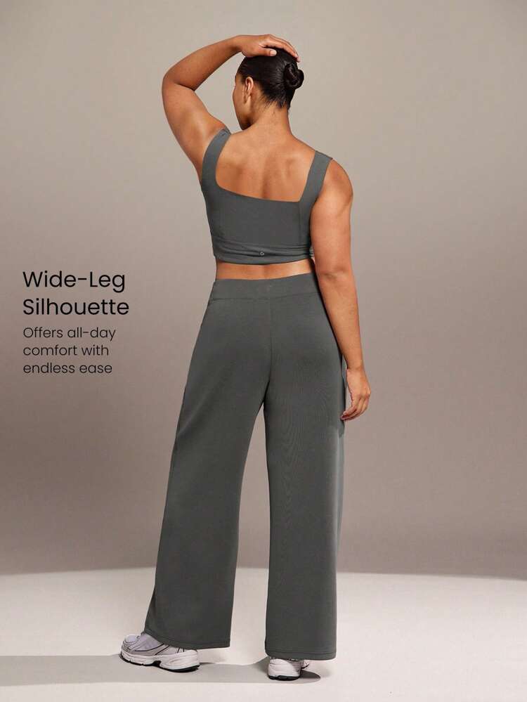 Pantaloni casual quotidiani in modal di taglia comoda, con vita regolabile con laccetto, e tasche laterali