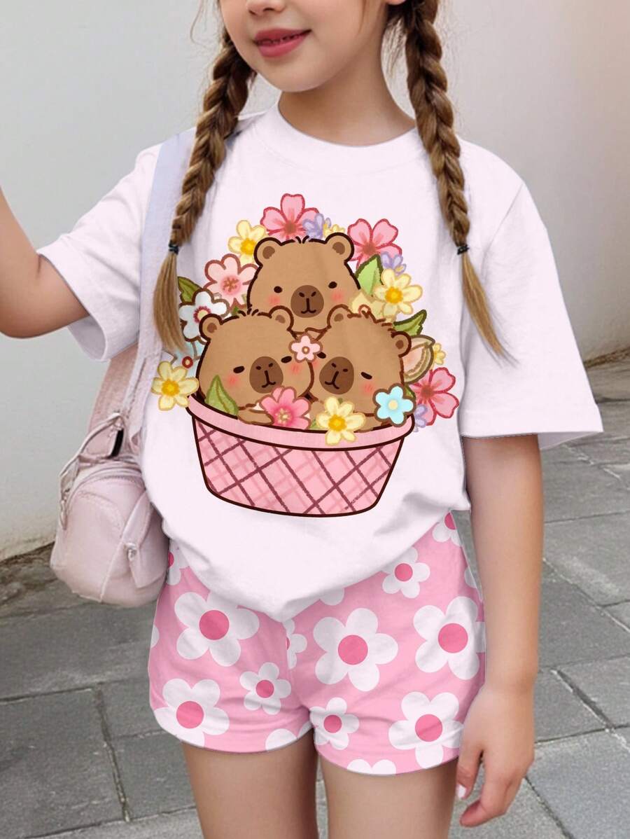 SHEIN Leap Crew 2 件可爱粉色水豚印花少女休闲简约短袖短裤套装,适合夏季、清凉夏日、度假氛围、可爱的 Y2K 椰子女孩波西米亚假期春假早午餐准备淡蓝色女孩之旅霓虹海滩氛围波西米亚嬉皮音乐节 - 彩色 - 查看 1