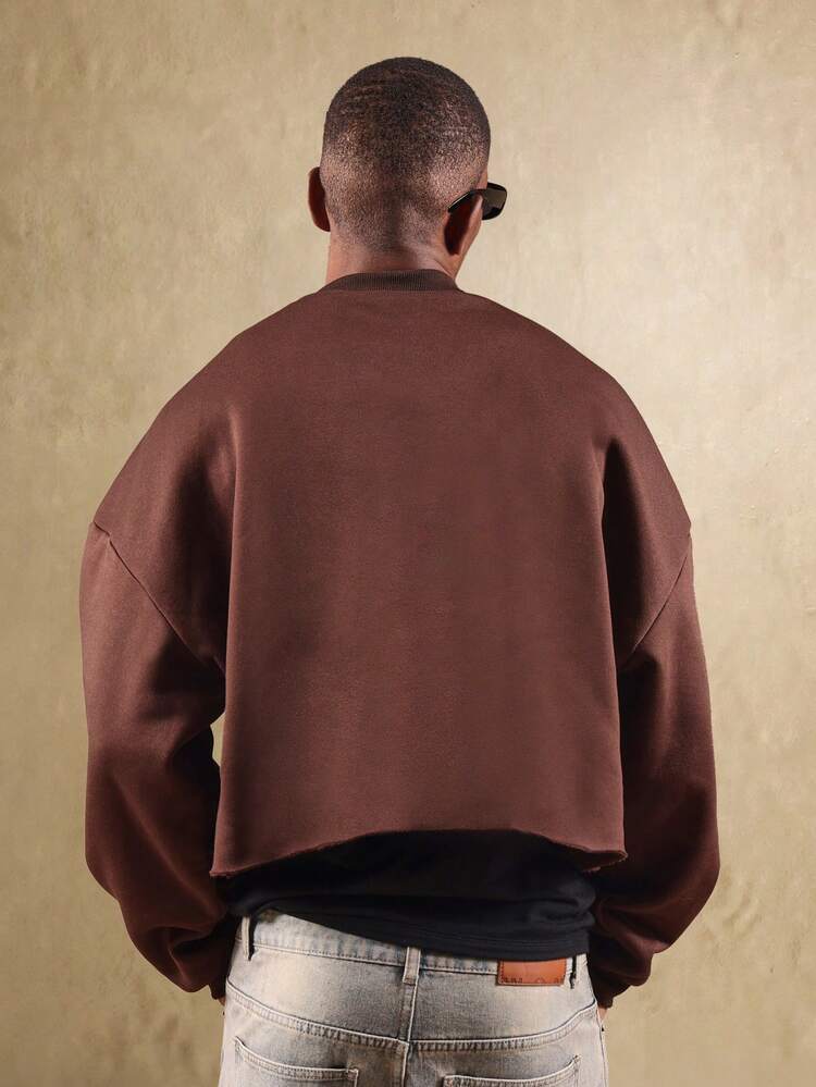 Kurzes Sweatshirt mit offenem Saum und Stadtlogo