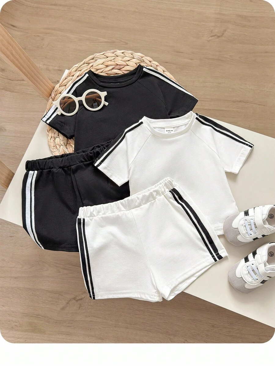 Conjunto informal de cuatro piezas para bebé que incluye sudadera con cuello redondo acanalado y manga raglán, pantalones cortos y bloques de color para niño y niña - Blanco y Negro - Ver 1