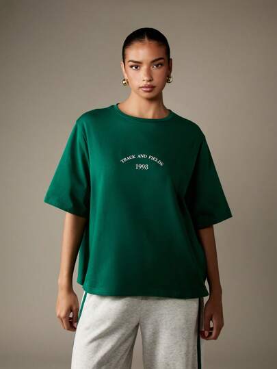 MISSGUIDED Track And Fields Vintage Style Oversized T Shirt Retro 90s Streetwear Varsity Text Graphics College Style Athleisure Tee