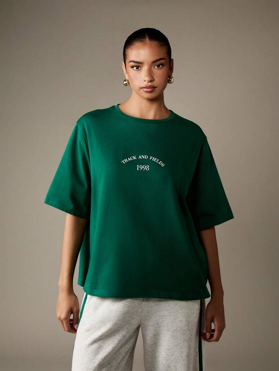 MISSGUIDED Oversized T Shirt With Retro Track Text Print｜MISSGUIDED