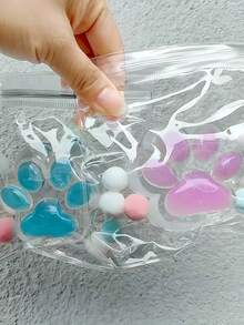 Zazumi 1 Stück transparente Katzen-Pfoten-Glitzer-rosa-blaue quetschbare Spielzeug mit langsamer Rückfederung, Stressabbau, Sensorik, Büro-Accessoire für Erwachsene, Zuhause, Karneval, Neujahrsgeschenk, Kawaii Dekoration, Home-Office Grundausstattung