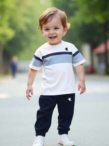 SHEIN Conjunto de camiseta de manga corta de cuello redondo y pantalones con estampado de rayas casual para bebés niños - Multicolor - Ver 6